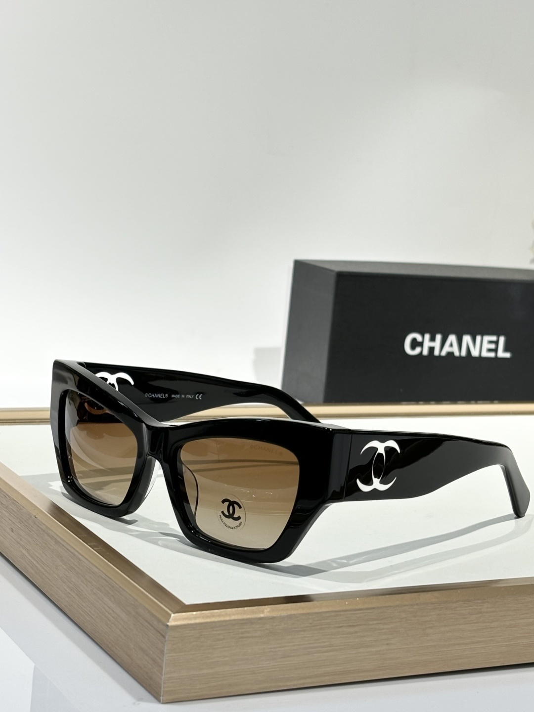 Chanel Luxury Square Sunglasses with Iconic White Cut-out Logo