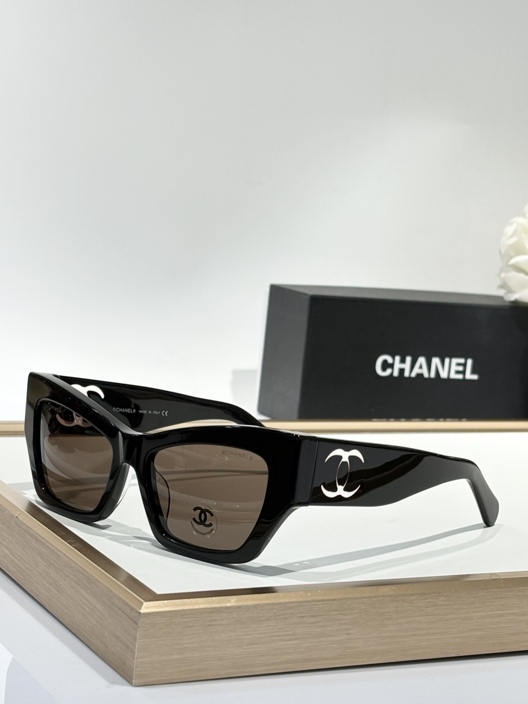 Chanel Luxury Square Sunglasses with Iconic White Cut-out Logo