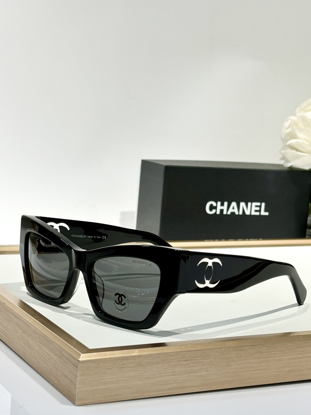 Chanel Luxury Square Sunglasses with Iconic White Cut-out Logo
