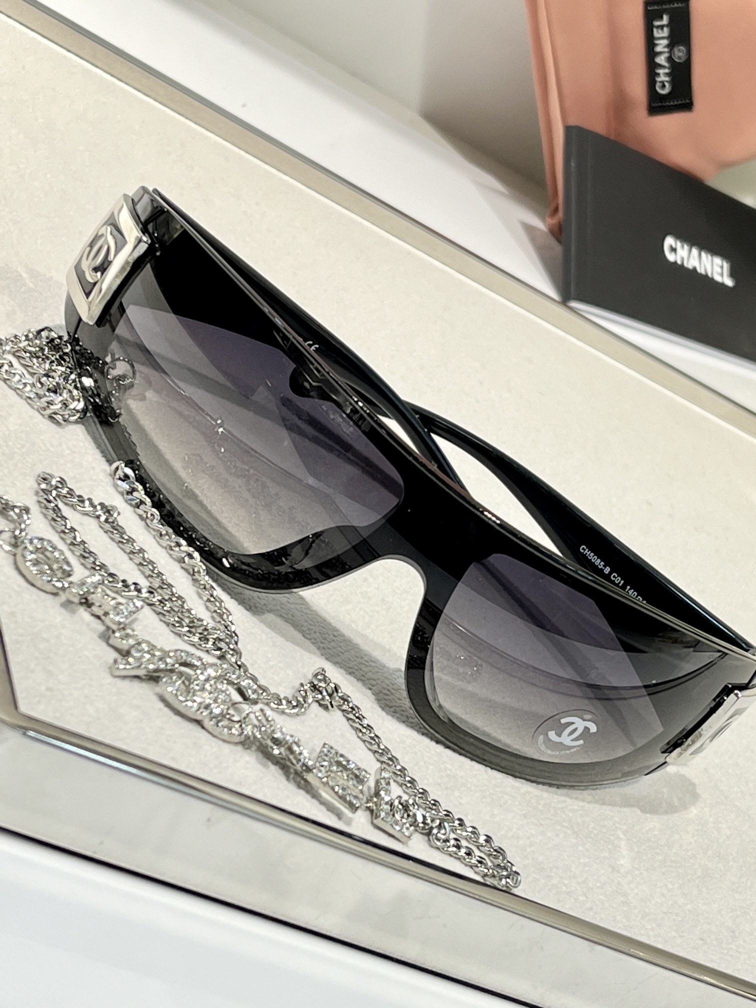 Chanel Luxury Black Shield Sunglasses with Iconic CC Logo Detail
