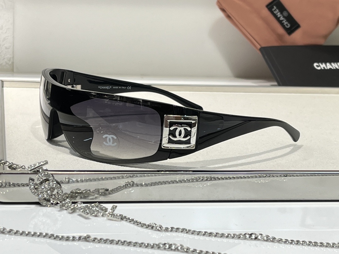 Chanel Luxury Black Shield Sunglasses with Iconic CC Logo Detail