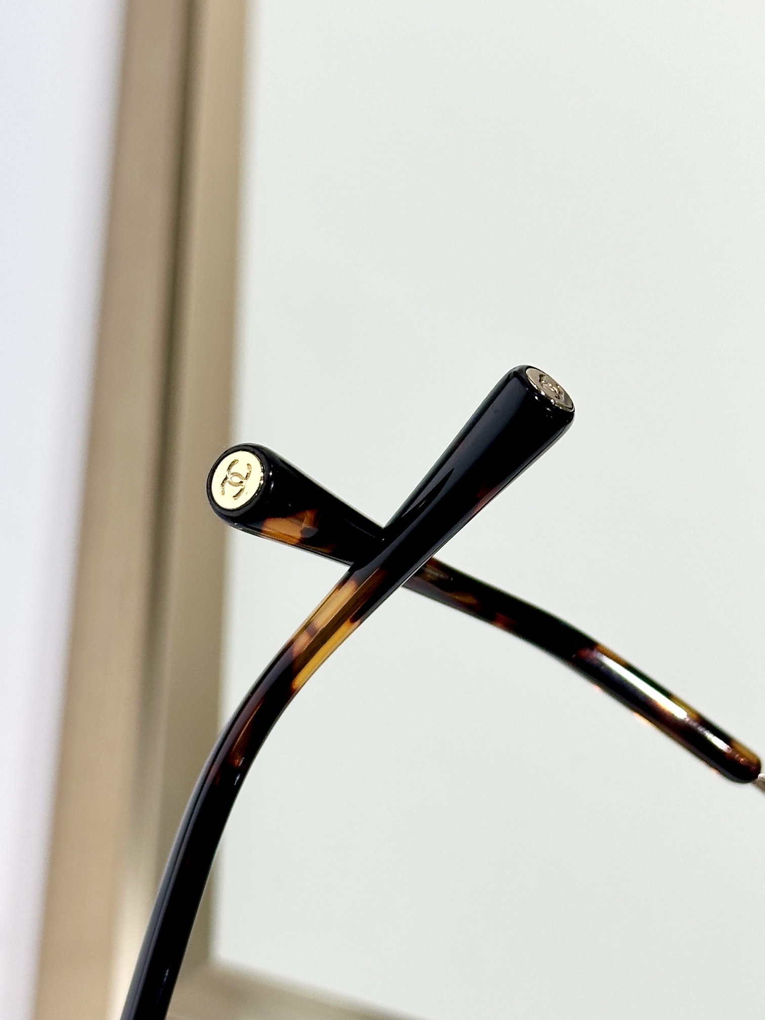 Chanel Rimless Cat-Eye Sunglasses - Gold CC Logo & Tinted Lenses