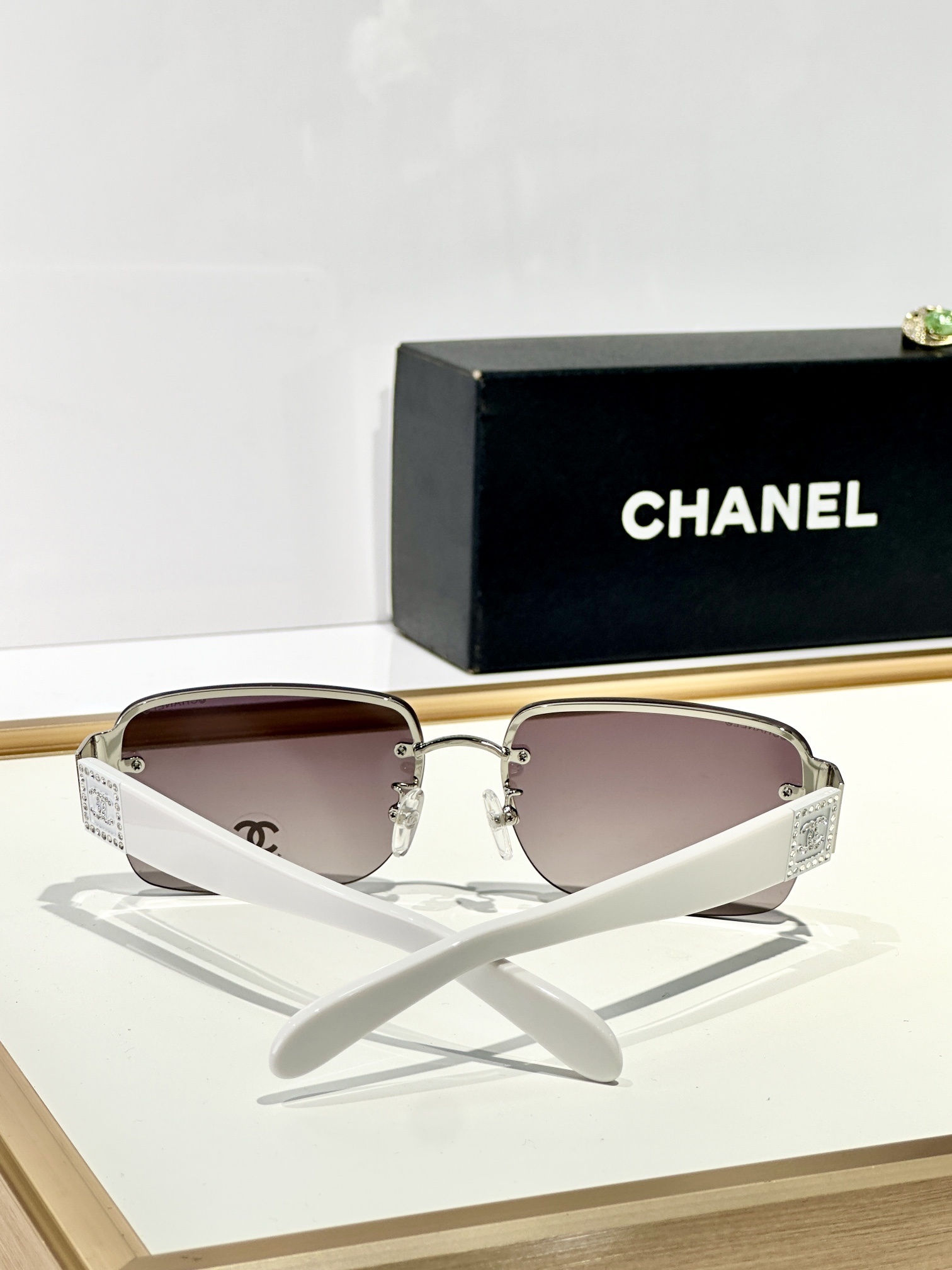 Chanel Rimless Rectangle Sunglasses with Crystal CC Logo