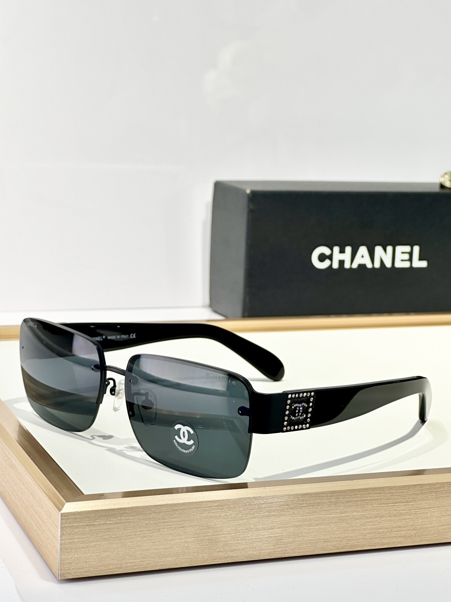 Chanel Rimless Rectangle Sunglasses with Crystal CC Logo