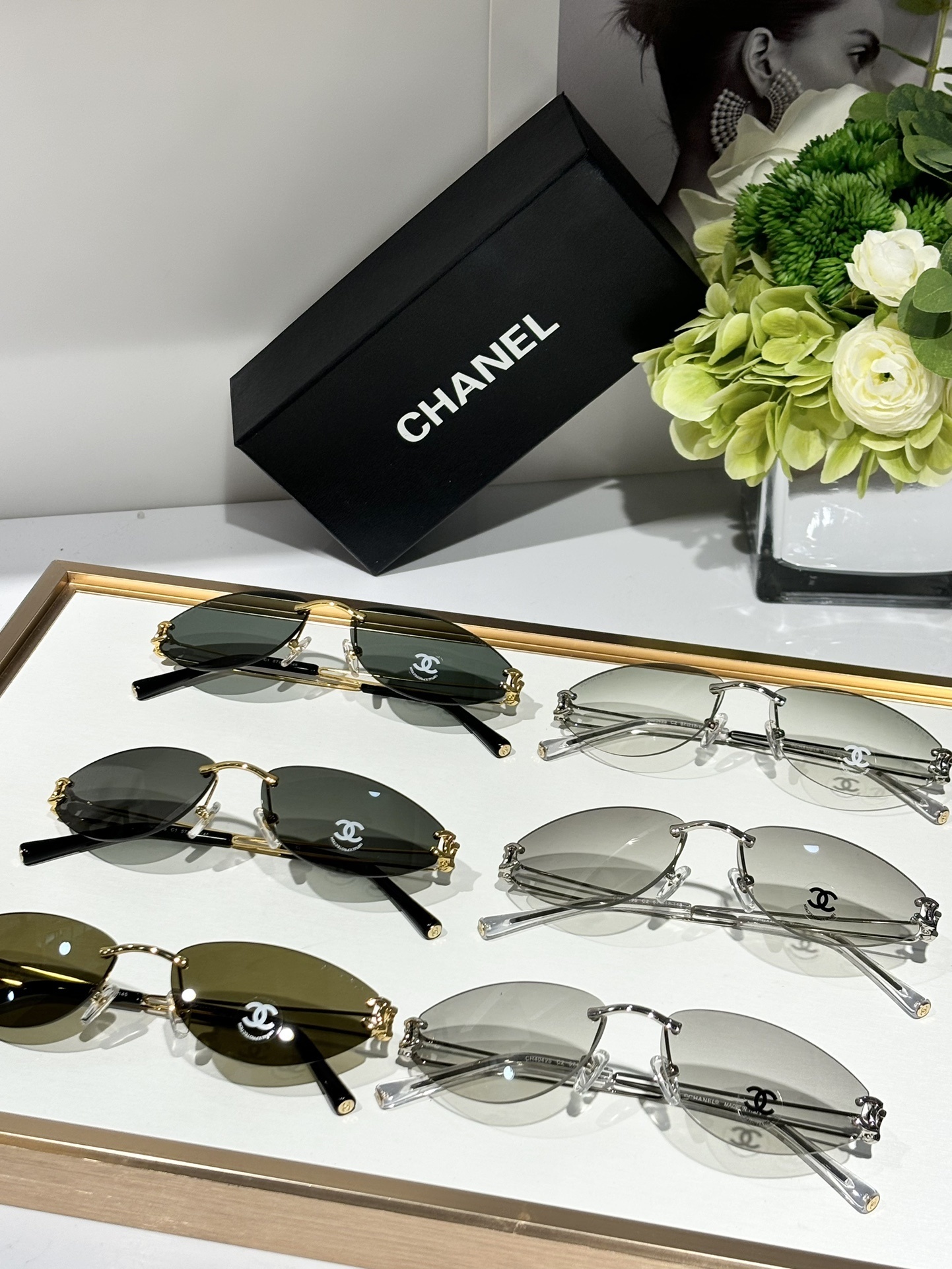 Chanel Luxury Rimless Oval Sunglasses with CC Logo Metal Frame