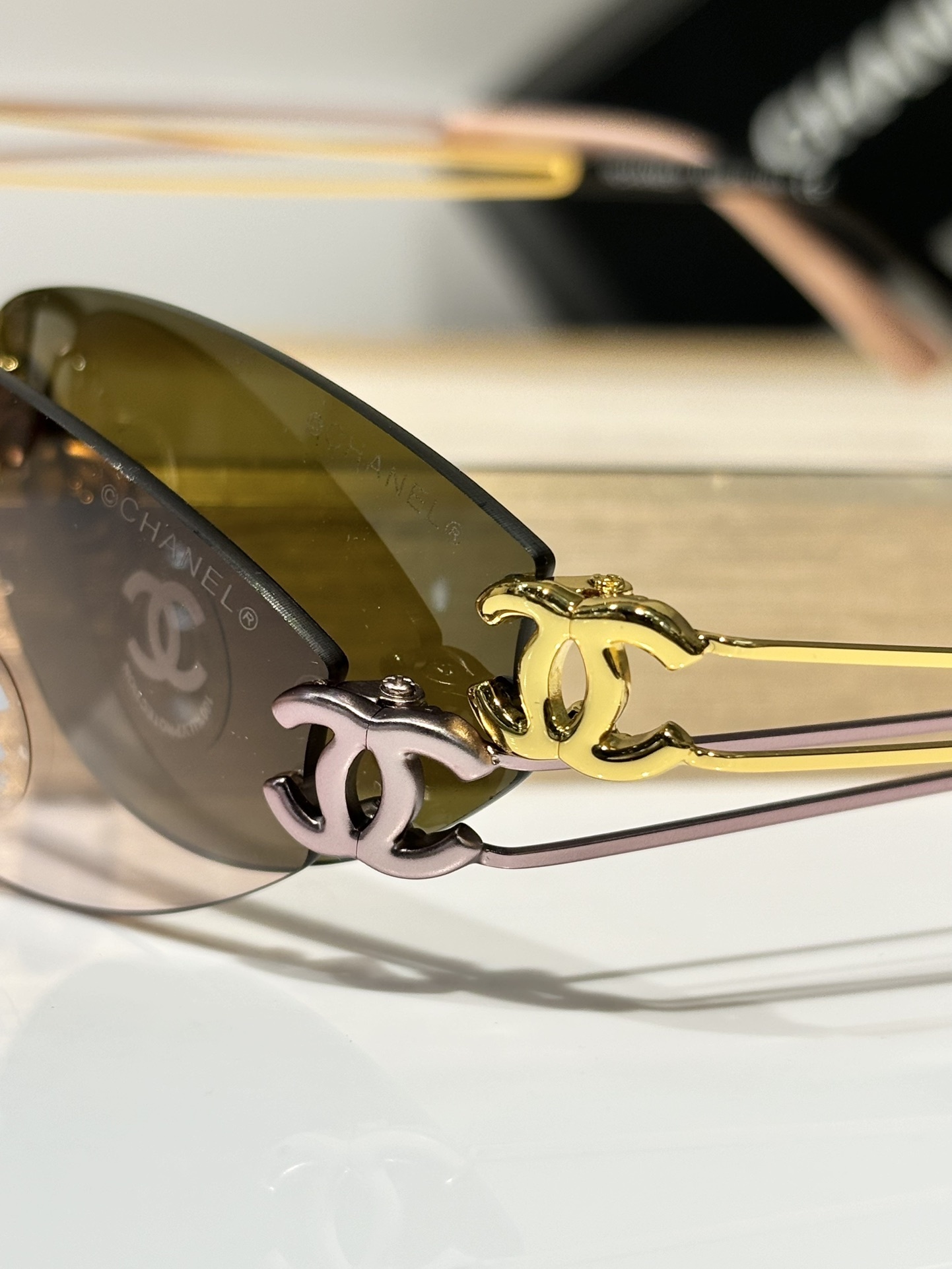 Chanel Luxury Rimless Oval Sunglasses with CC Logo Metal Frame