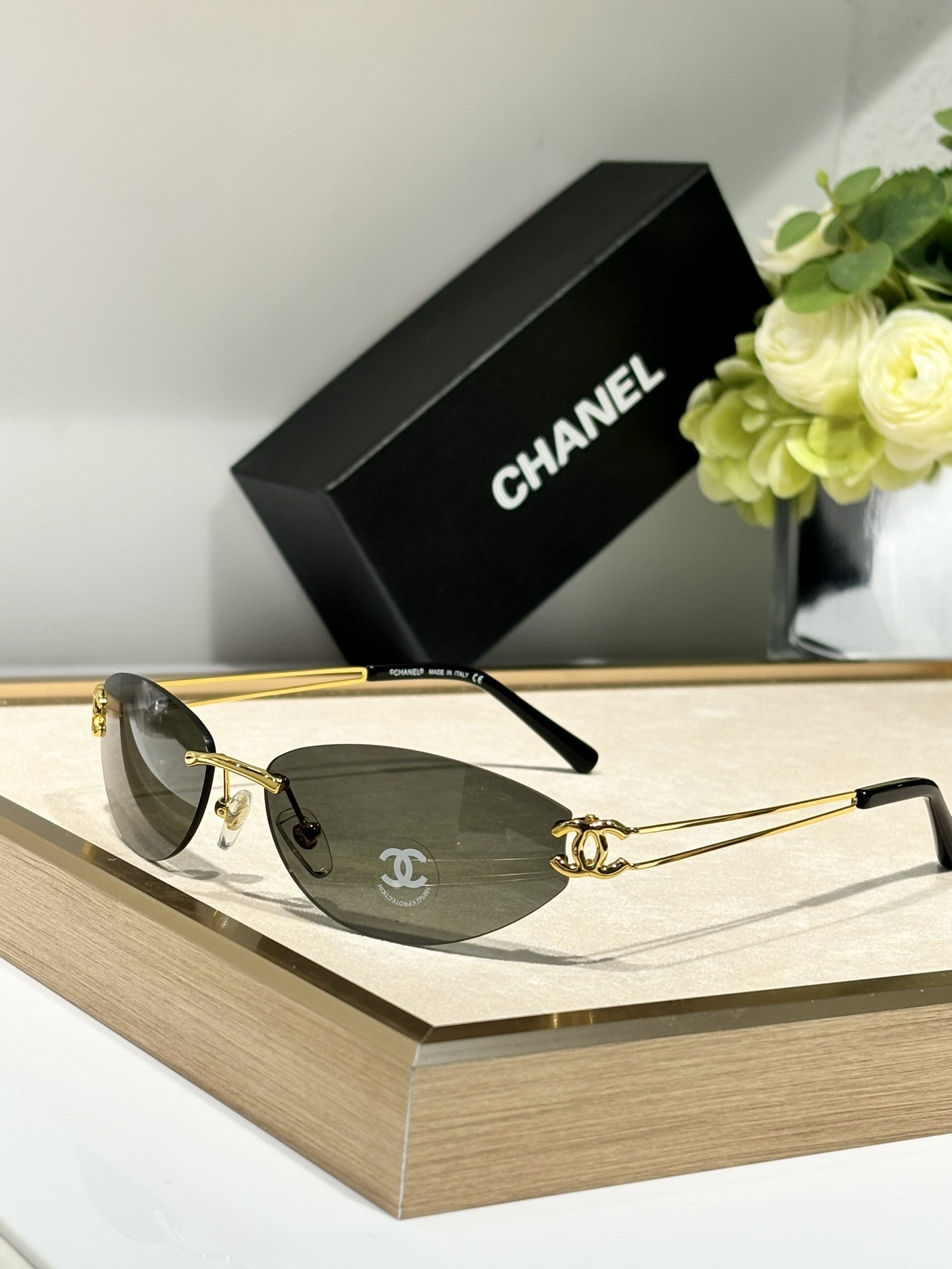 Chanel Luxury Rimless Oval Sunglasses with CC Logo Metal Frame