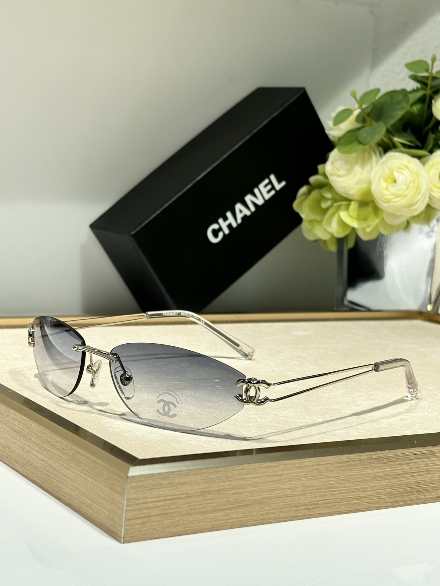 Chanel Luxury Rimless Oval Sunglasses with CC Logo Metal Frame