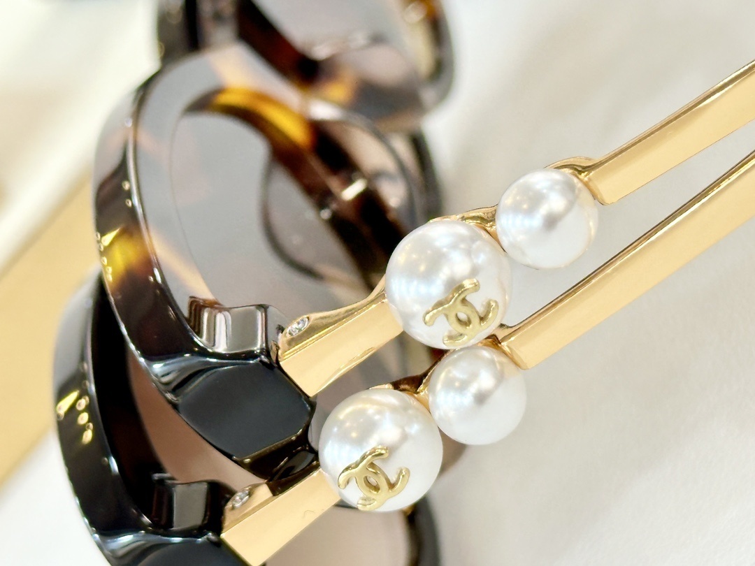 Chanel Luxury Pearl Accent Cat-Eye Sunglasses - Black & Gold Frame