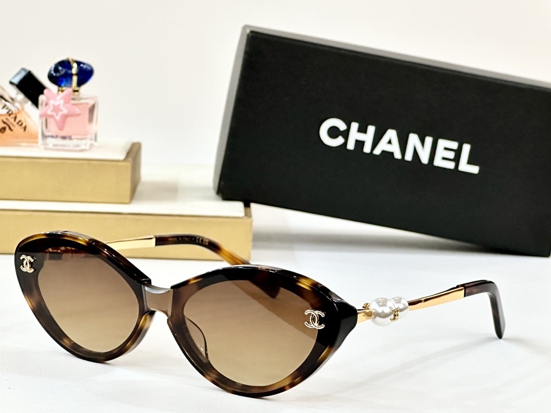 Chanel Luxury Pearl Accent Cat-Eye Sunglasses - Black & Gold Frame