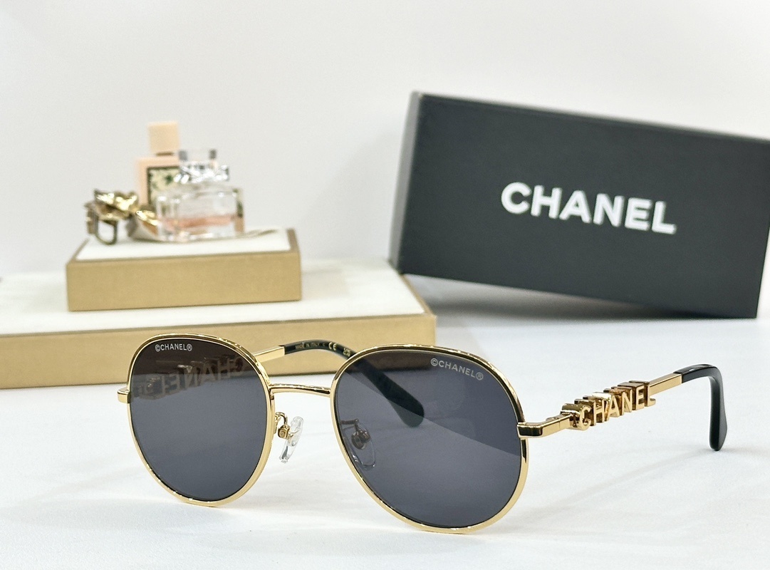 Luxury Chanel Round Sunglasses with Gold Logo Lettering
