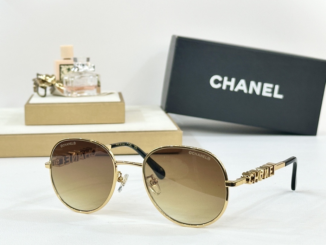 Luxury Chanel Round Sunglasses with Gold Logo Lettering
