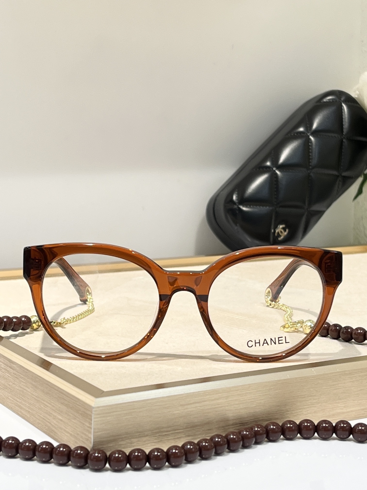 Chanel Luxury Cat-Eye Eyeglasses with Elegant Beaded Chain