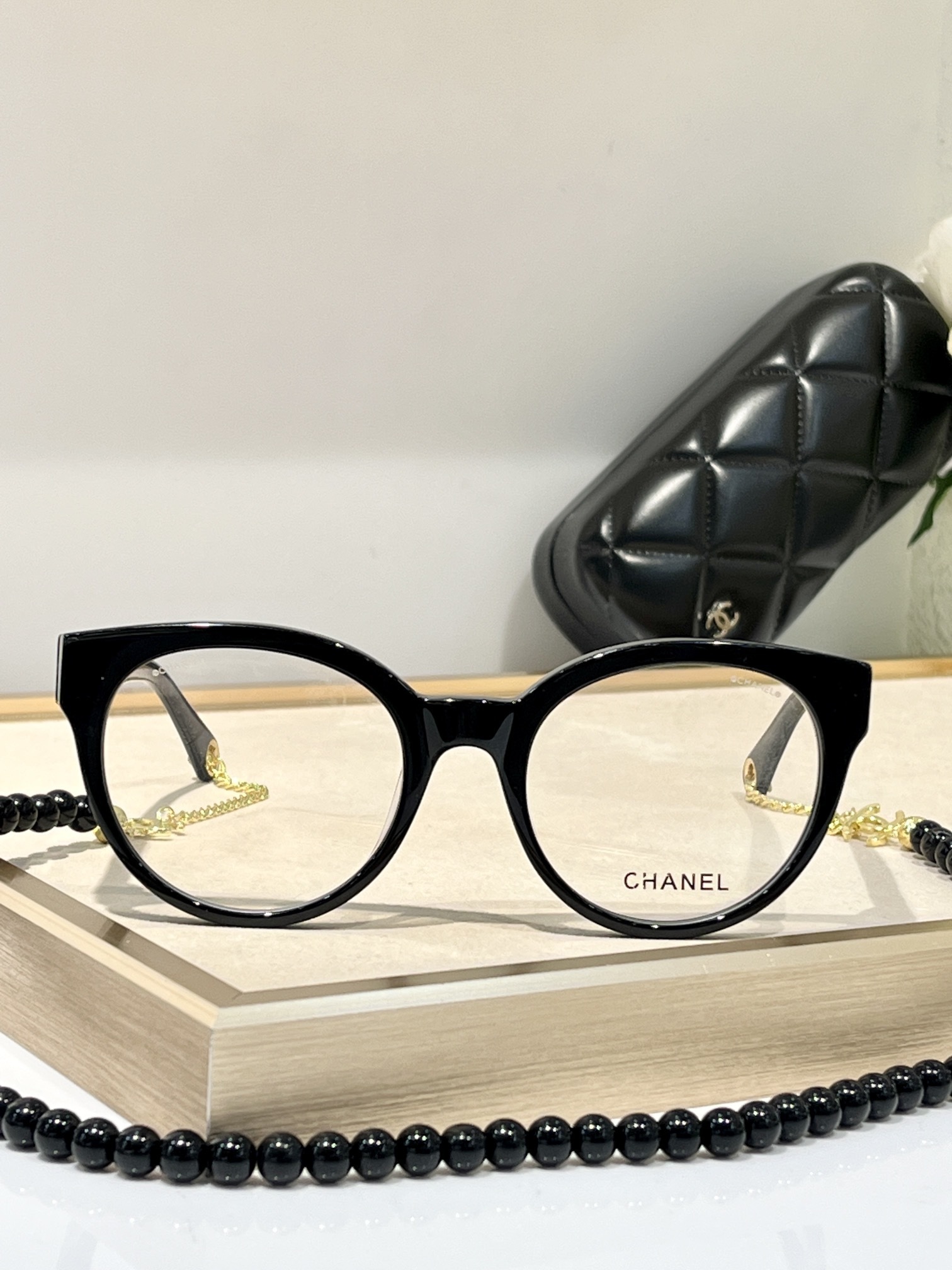 Chanel Luxury Cat-Eye Eyeglasses with Elegant Beaded Chain