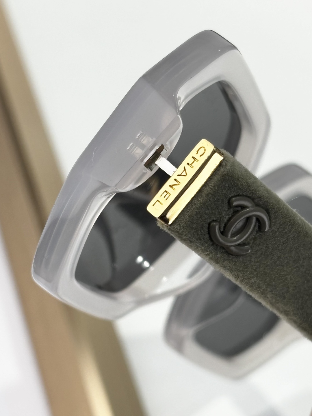 Chanel Luxury Translucent Grey Sunglasses with Velvet Temple Detail