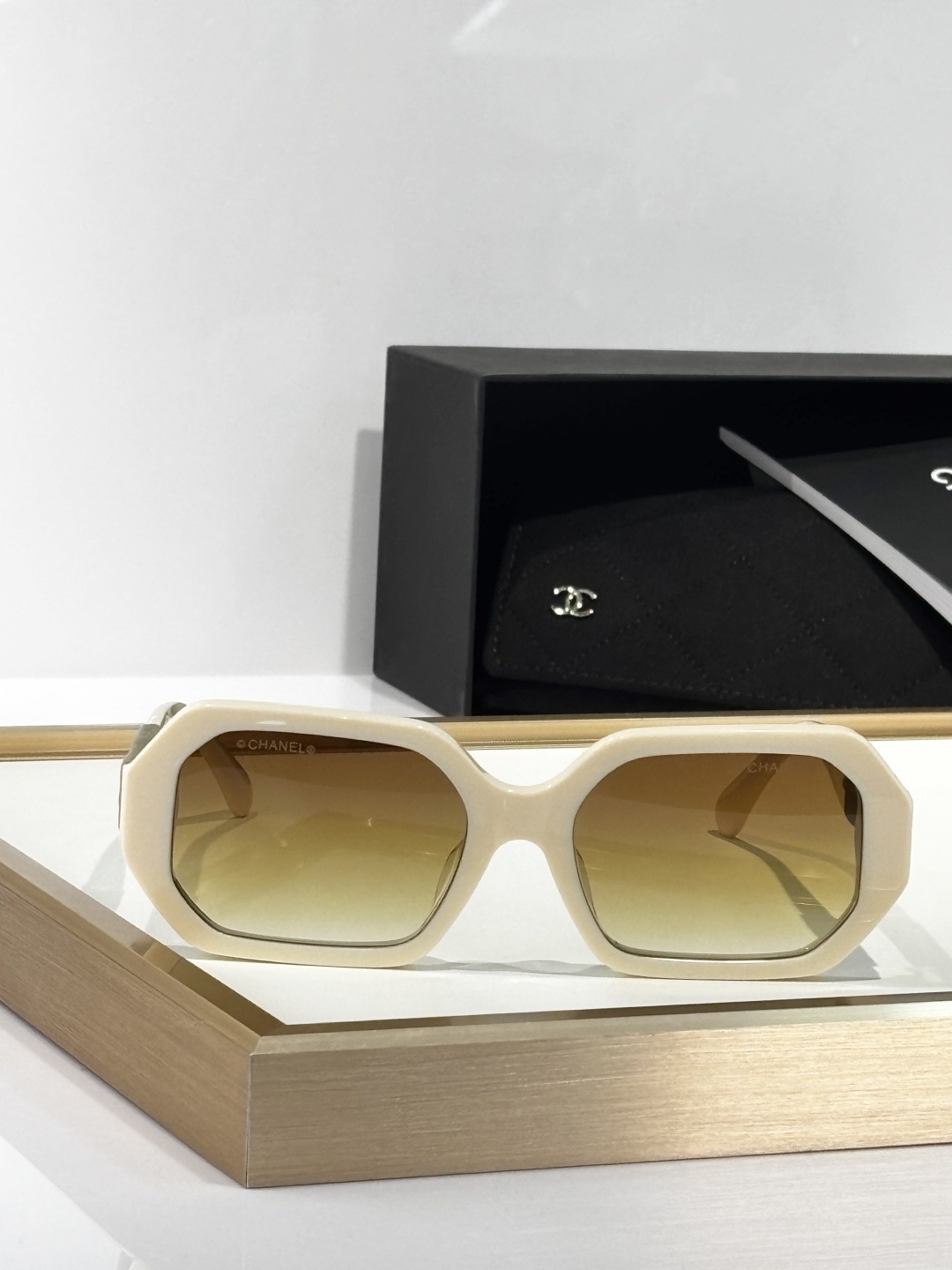 Chanel Luxury Cream Square Sunglasses with Suede Logo Temples