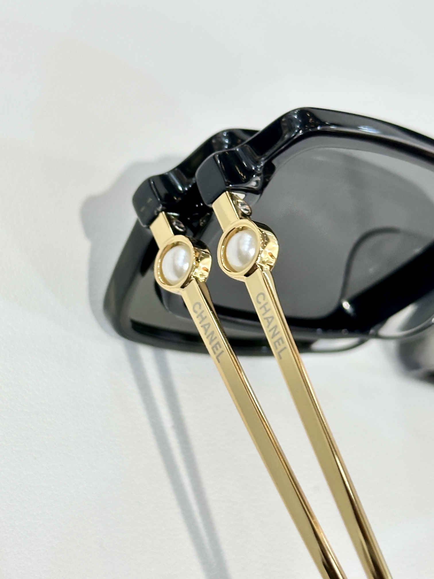 Luxury Chanel Square Sunglasses with Pearl Accent & Gold Temples