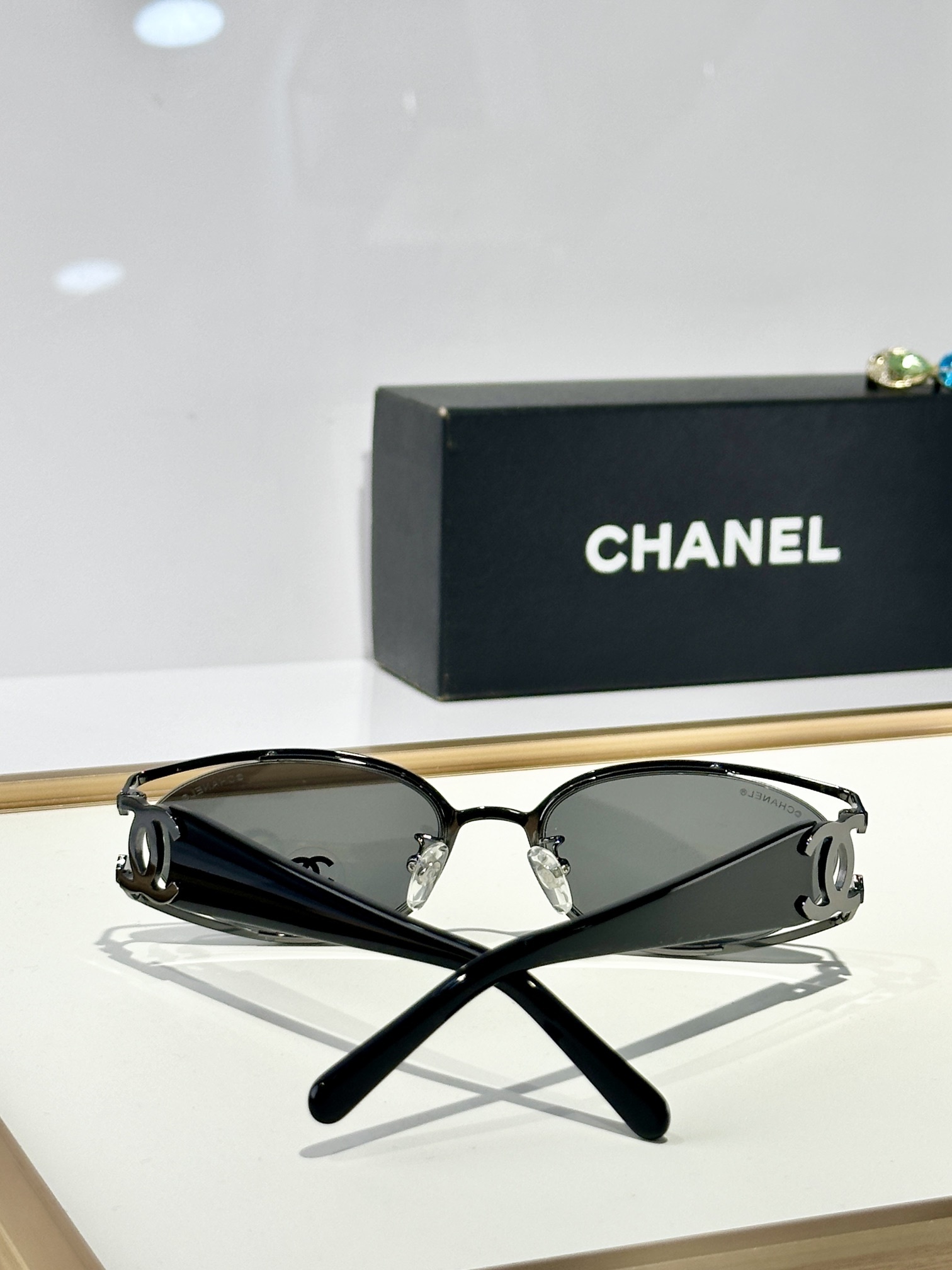 Chanel Luxury Oval Sunglasses with Signature Gold CC Logo