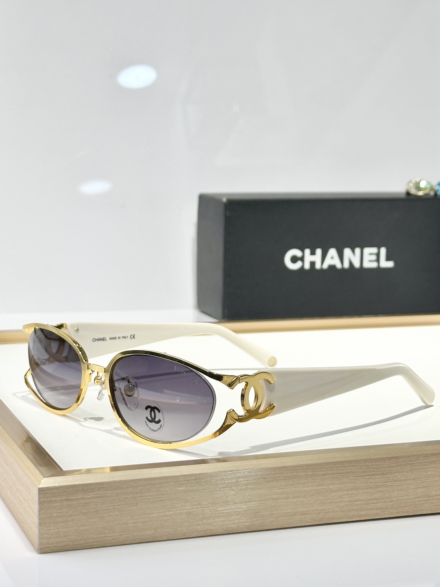 Chanel Luxury Oval Sunglasses with Signature Gold CC Logo