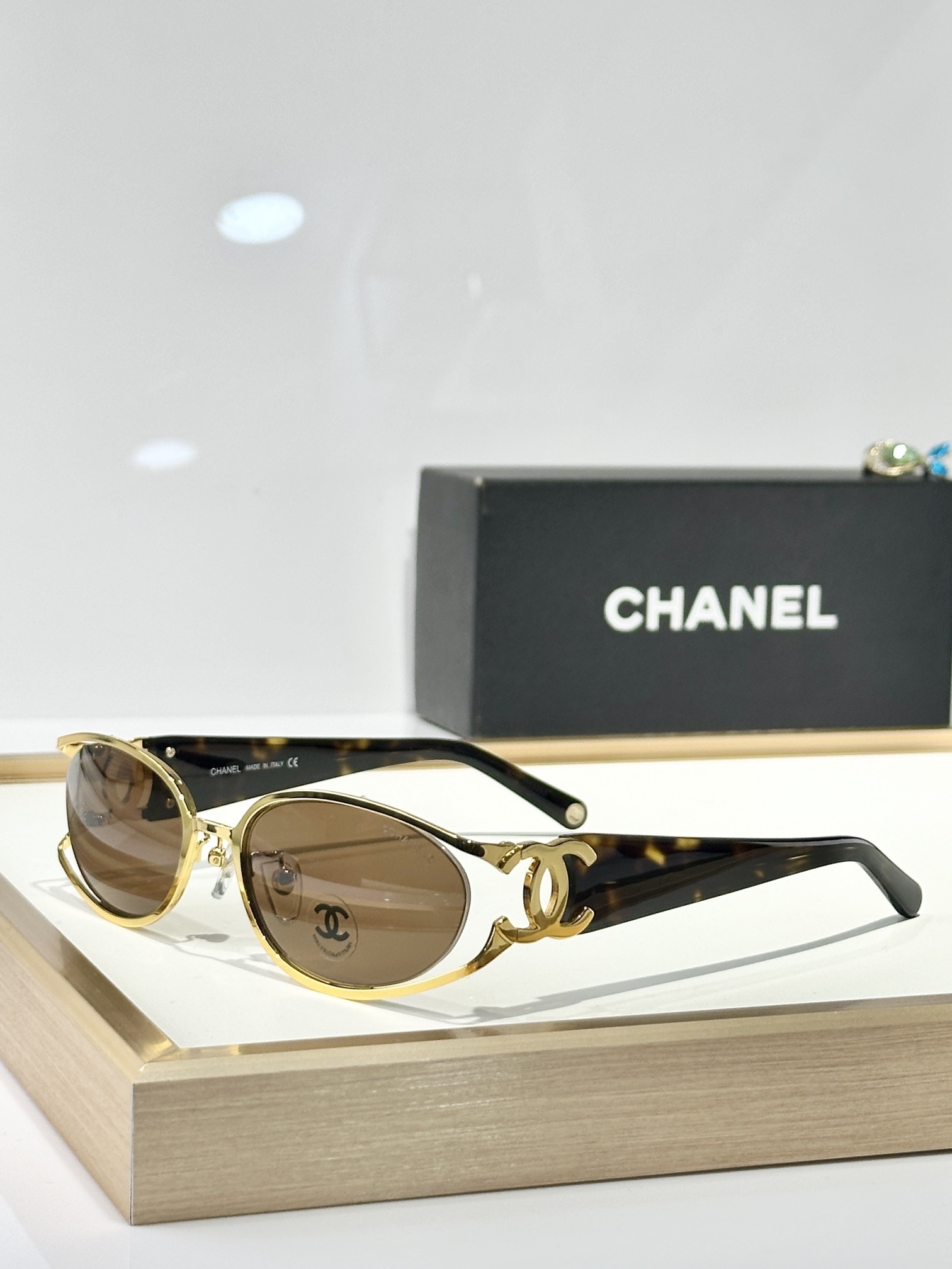 Chanel Luxury Oval Sunglasses with Signature Gold CC Logo