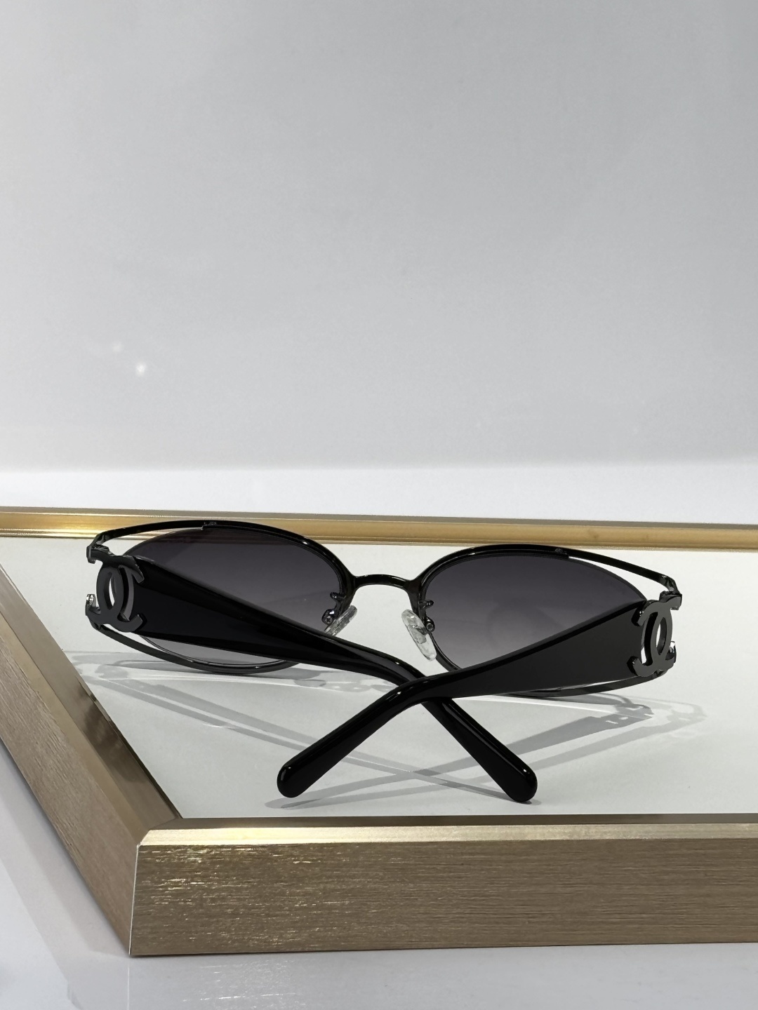 Luxury Chanel Oval Sunglasses - Silver Metal & Black Temple Design
