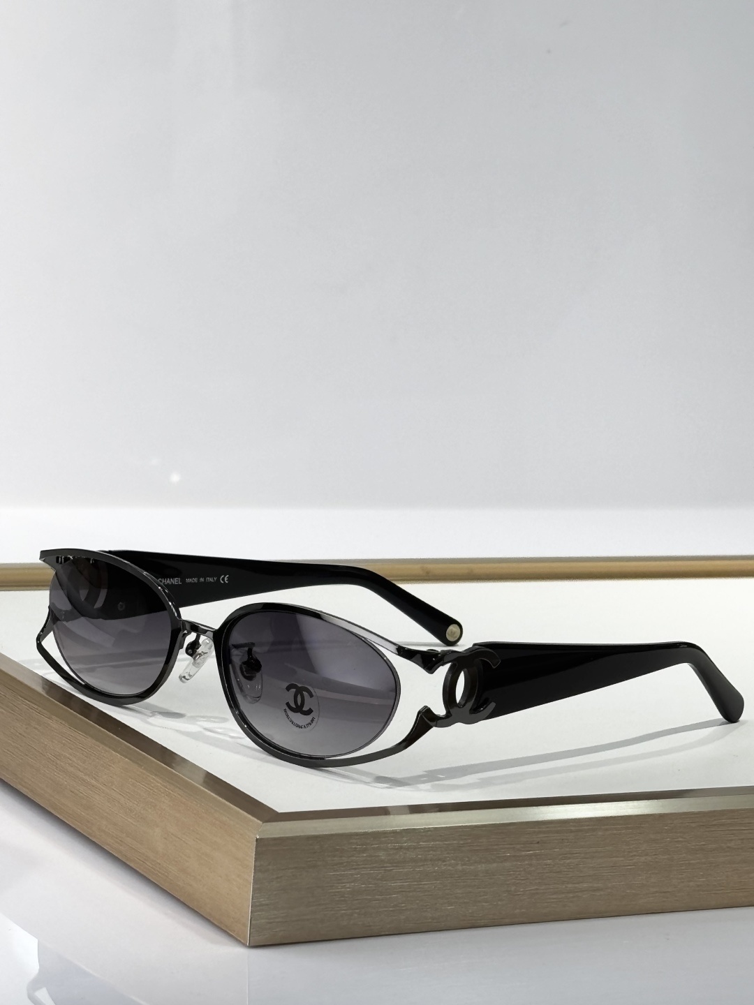 Luxury Chanel Oval Sunglasses - Silver Metal & Black Temple Design