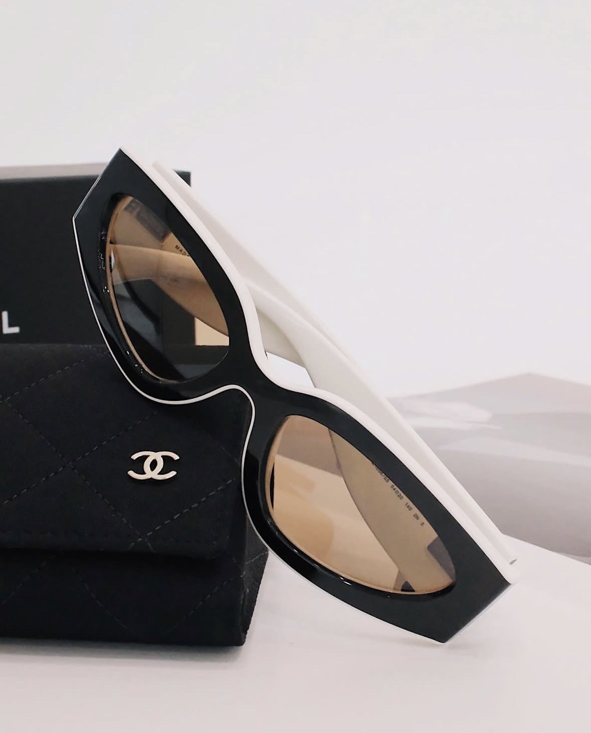 Chanel Luxury Two-Tone Rectangular Sunglasses - Black & White