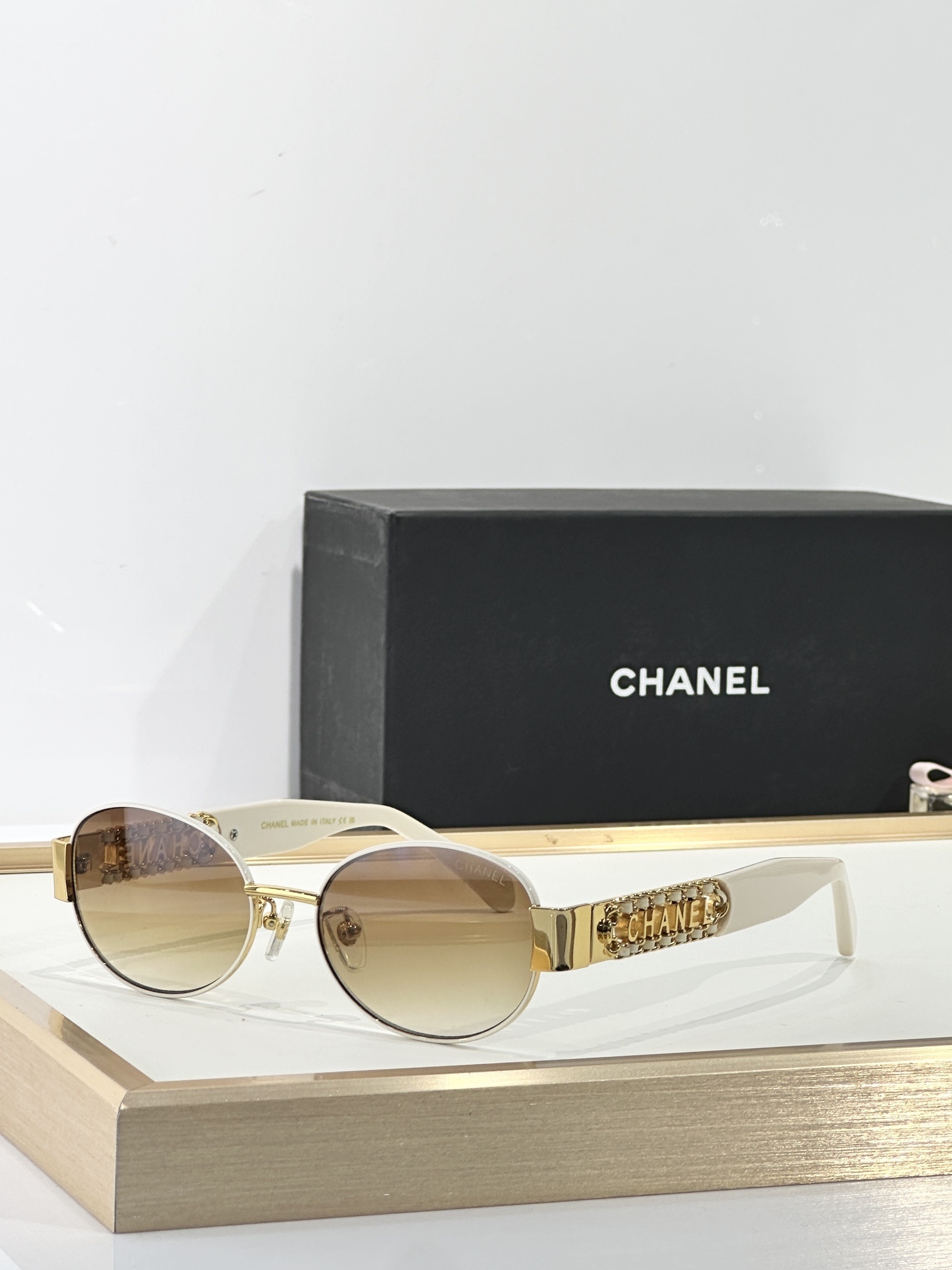 Chanel Oval Sunglasses with Gold Chain Logo Temples - Luxury Eyewear