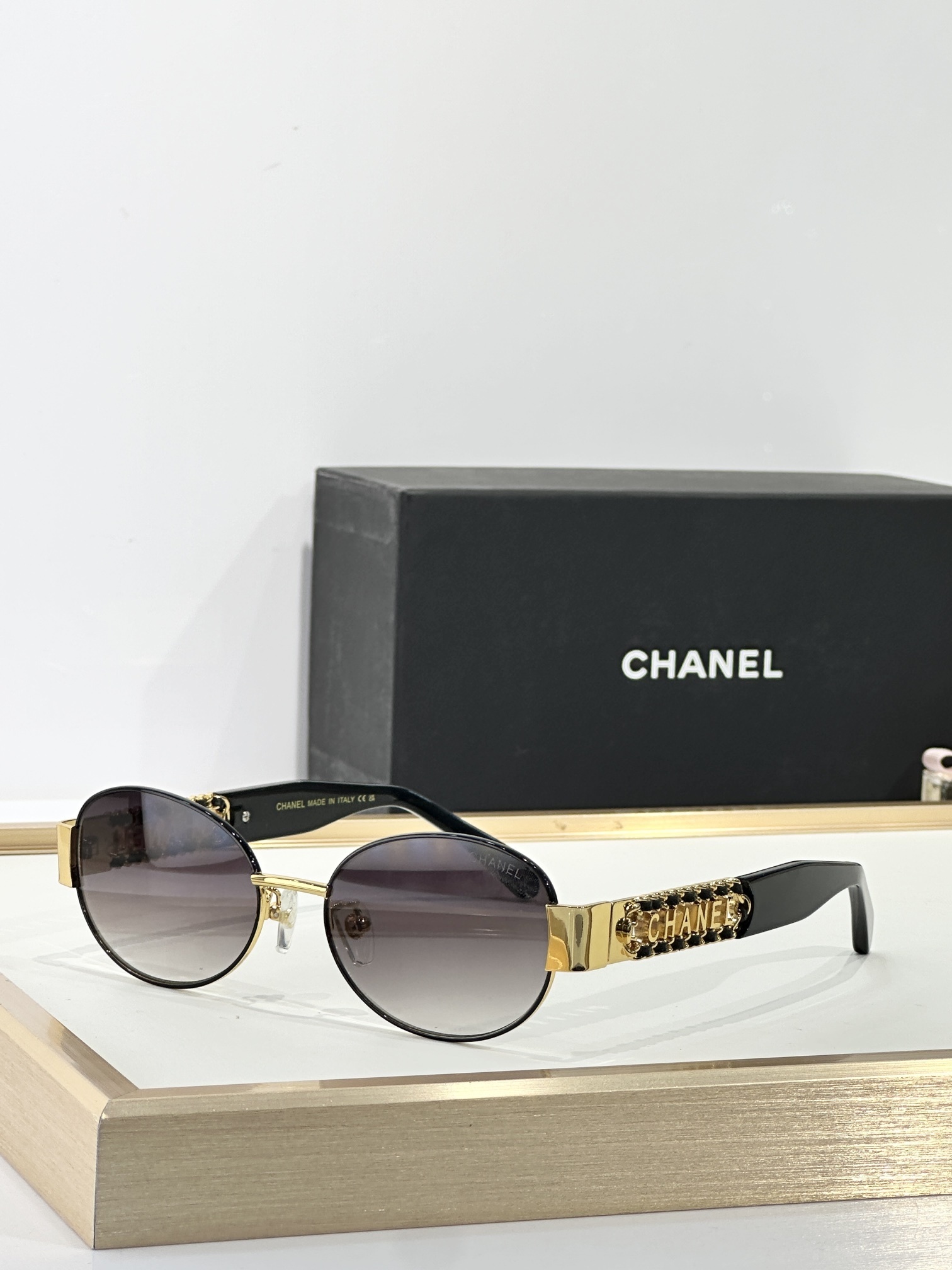 Chanel Oval Sunglasses with Gold Chain Logo Temples - Luxury Eyewear