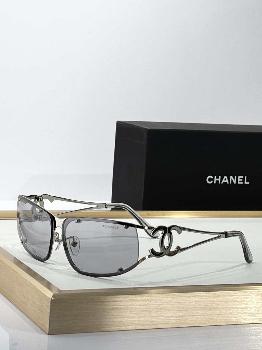 Chanel Luxury Rimless Sunglasses - Elegant CC Logo Metal Frame