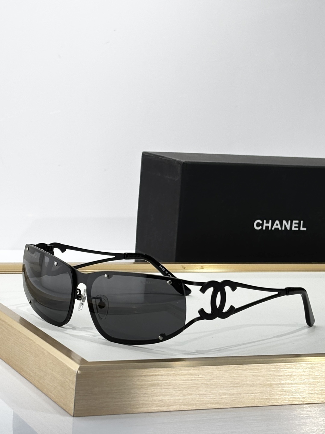 Chanel Luxury Rimless Sunglasses - Elegant CC Logo Metal Frame