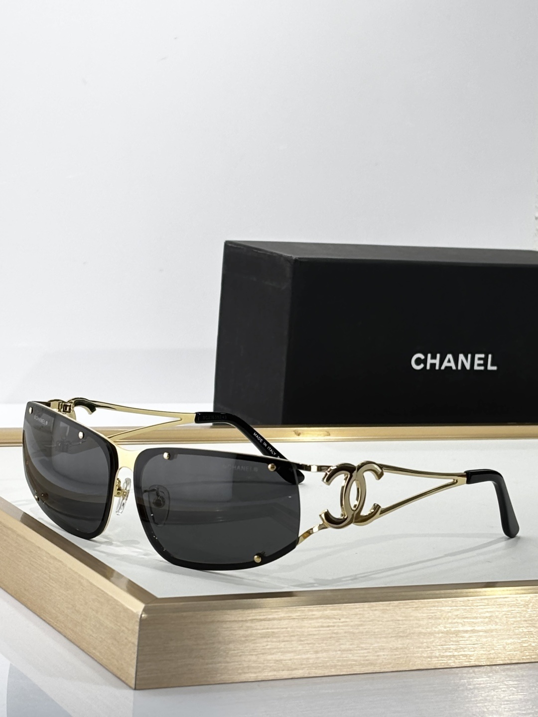 Chanel Luxury Rimless Sunglasses - Elegant CC Logo Metal Frame