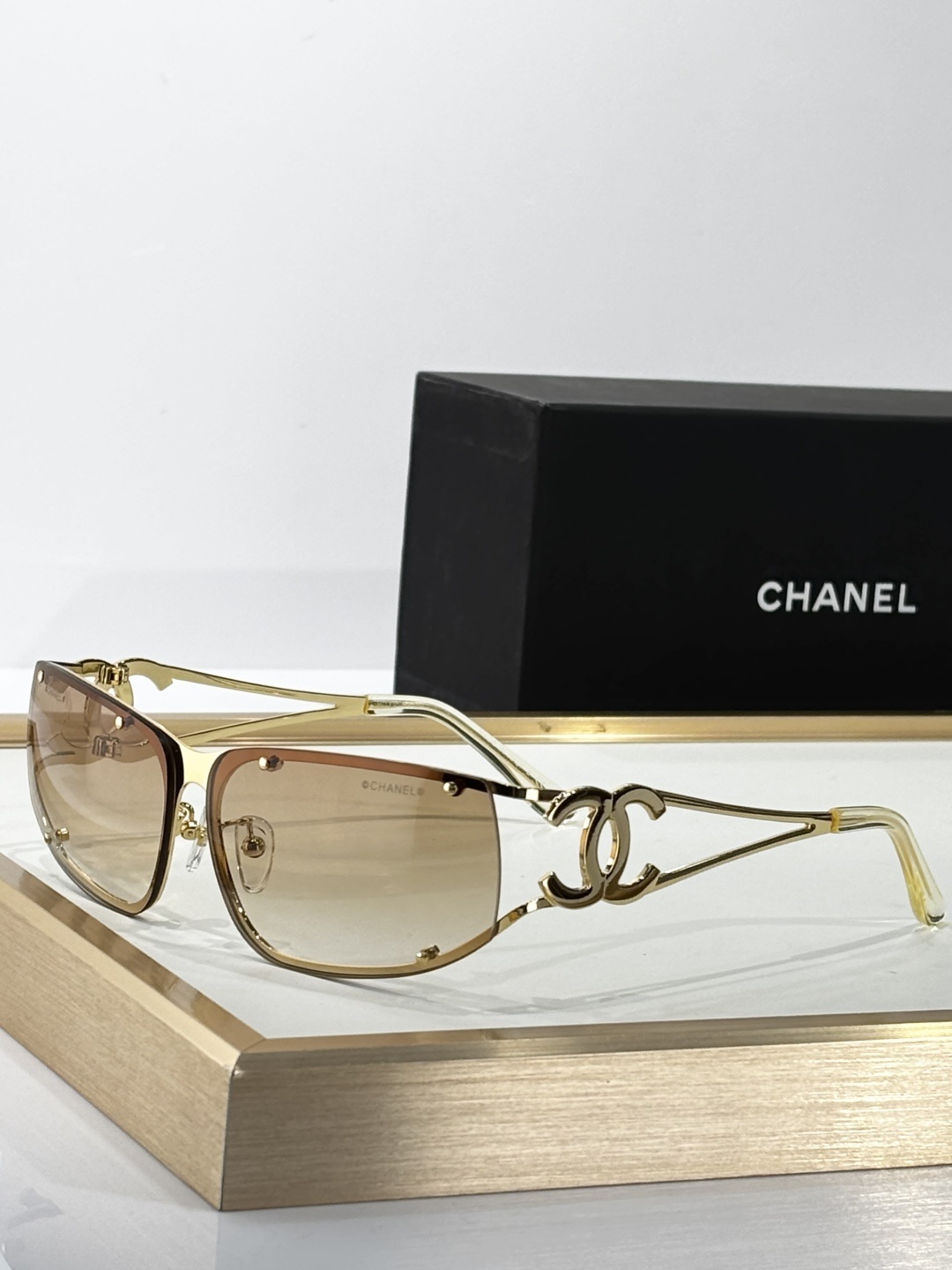 Chanel Luxury Rimless Sunglasses – Elegant CC Logo Metal Frame