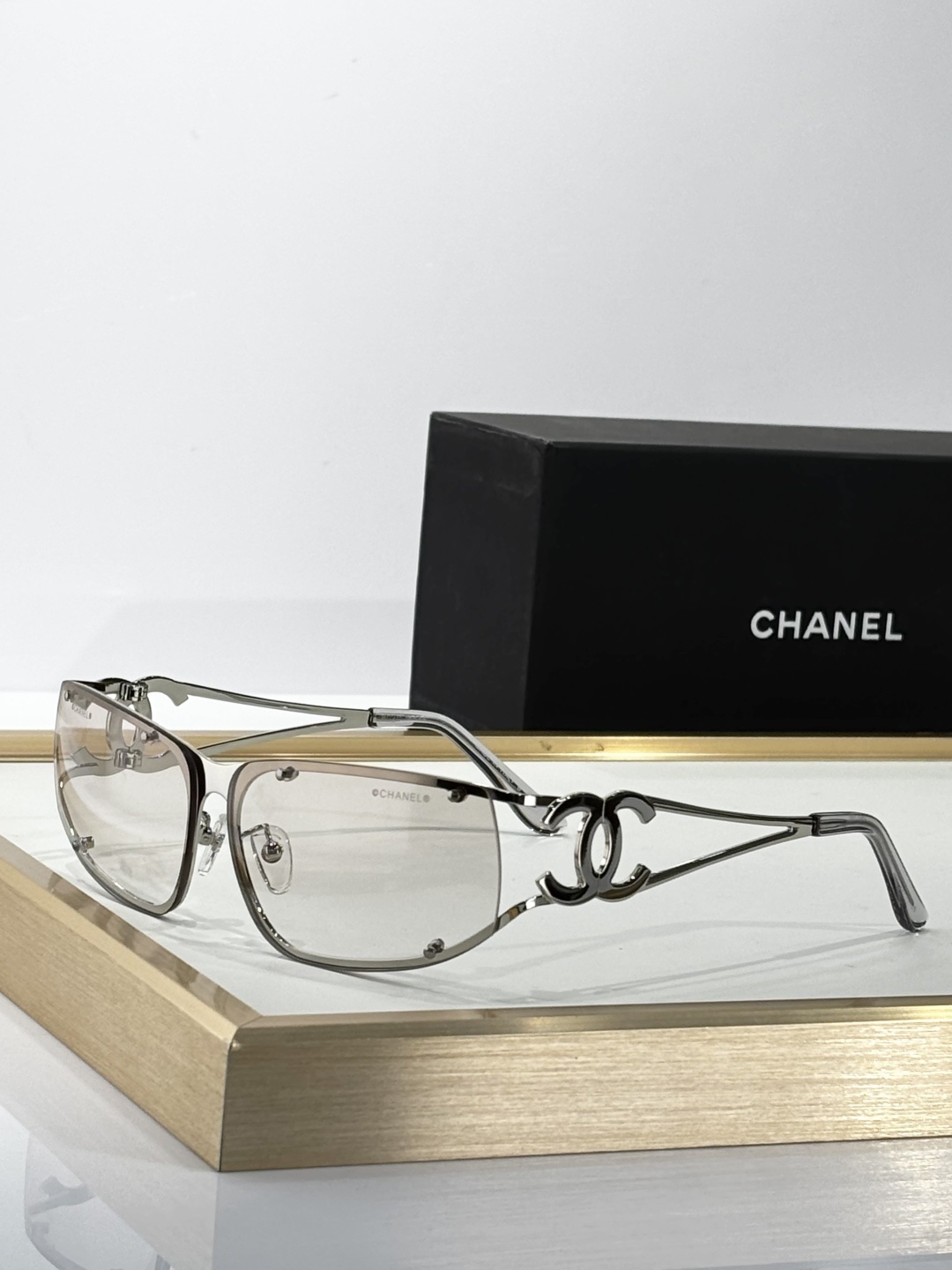 Chanel Silver Y2K Shield Sunglasses - Futuristic Rimless Eyewear
