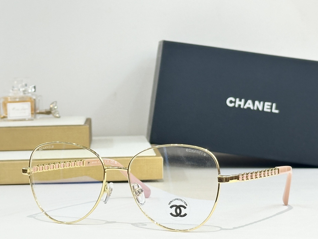 Chanel Women's Gold Round Eyeglasses with Pink Leather Chain