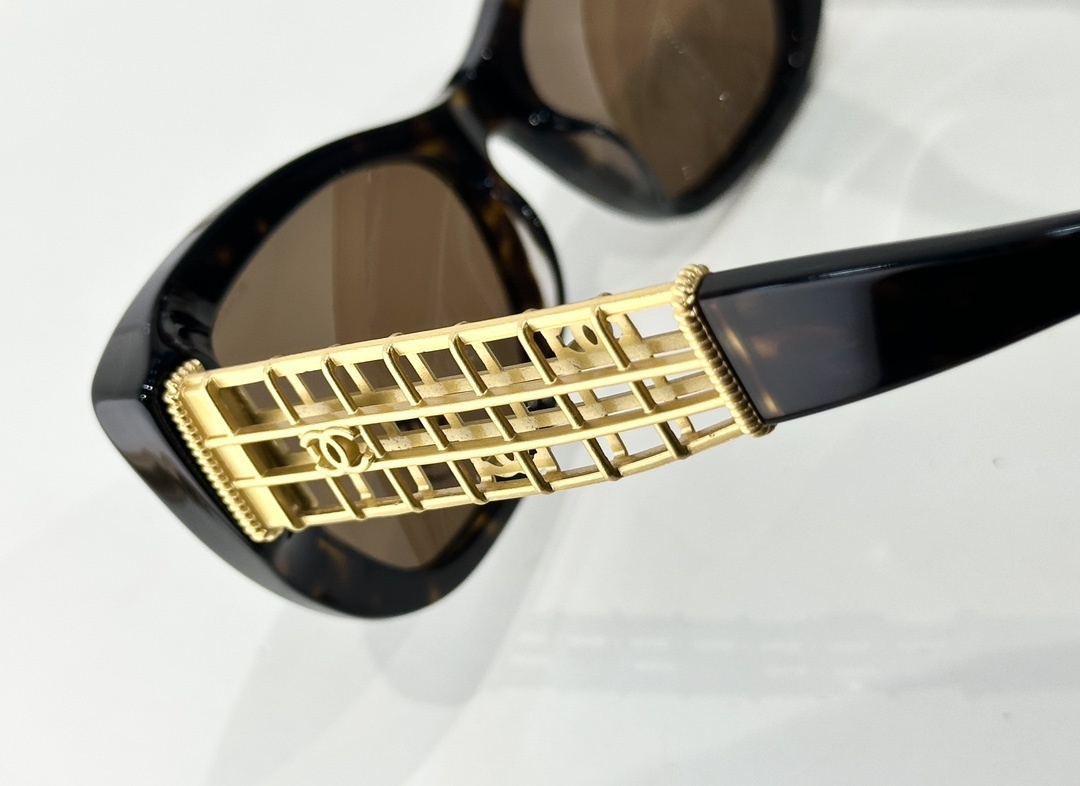 Chanel Luxury Cat-Eye Sunglasses with Gold Cage CC Logo Temples
