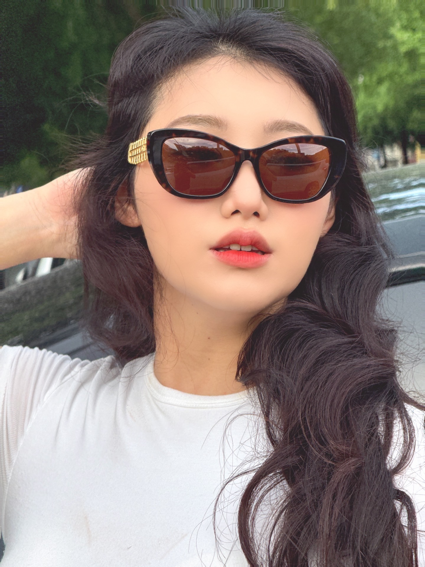 Chanel Women's Cat-Eye Sunglasses with Gold Lattice Temples