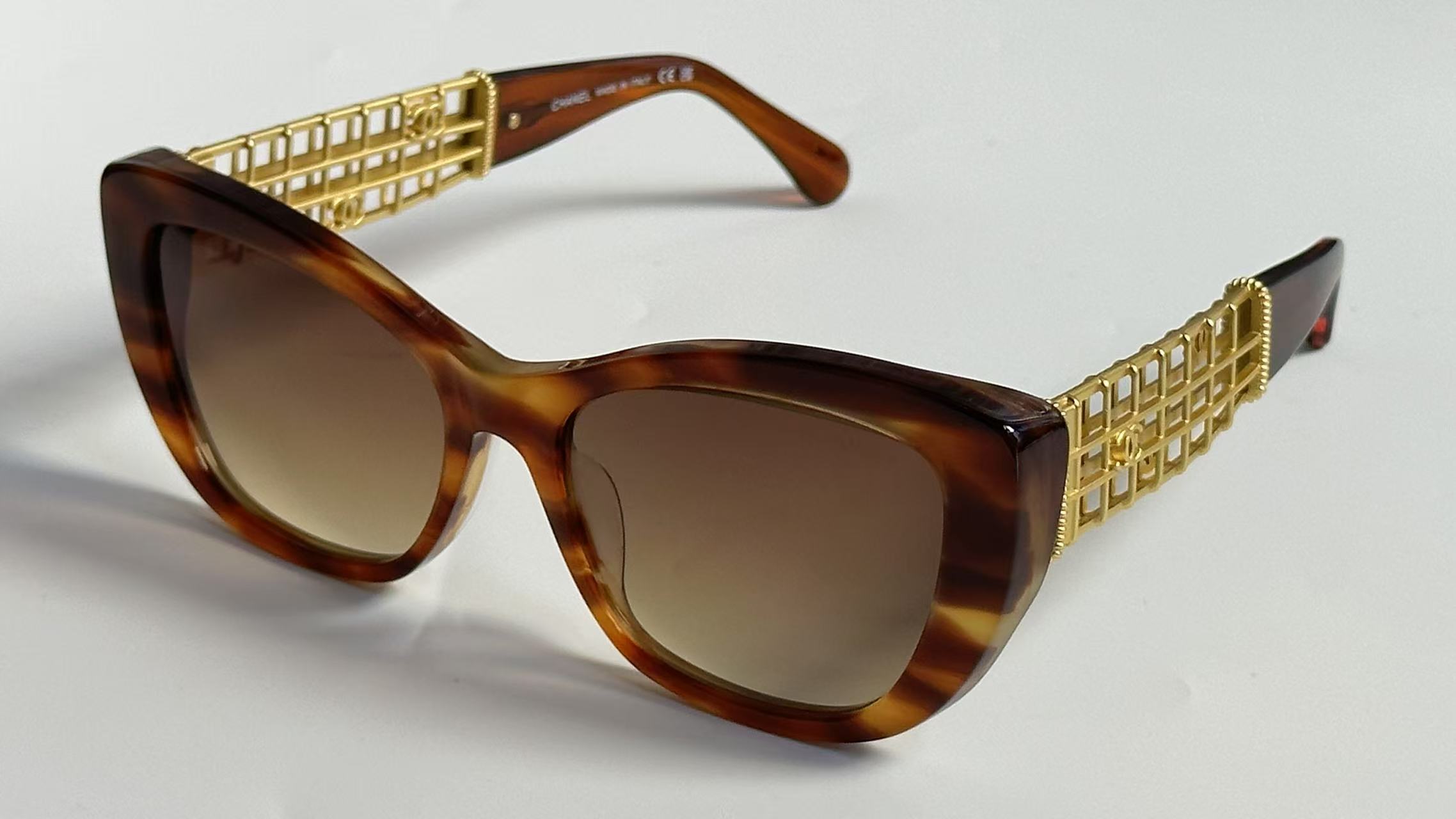 Luxury Chanel Cat Eye Sunglasses with Gold Lattice Temples
