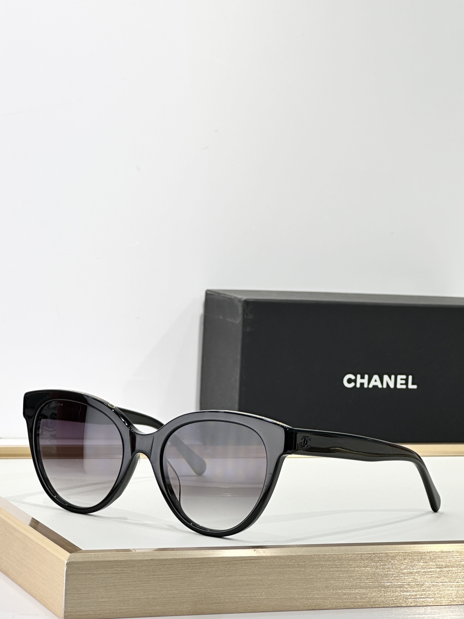 Chanel Luxury Cat-Eye Sunglasses with Signature Logo - Women's Eyewear