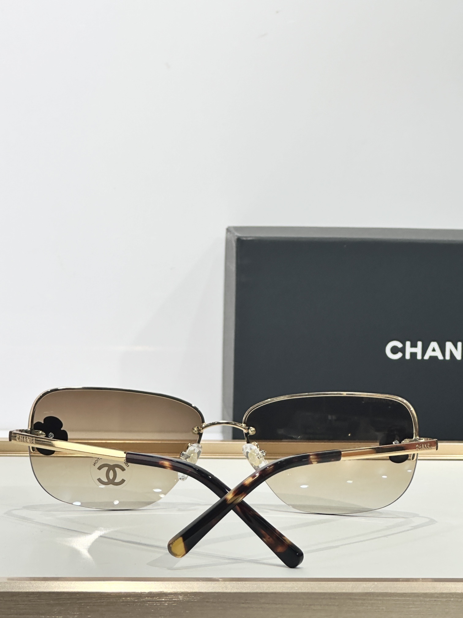 Chanel Camellia Flower Rimless Butterfly Sunglasses - Elegant Eyewear