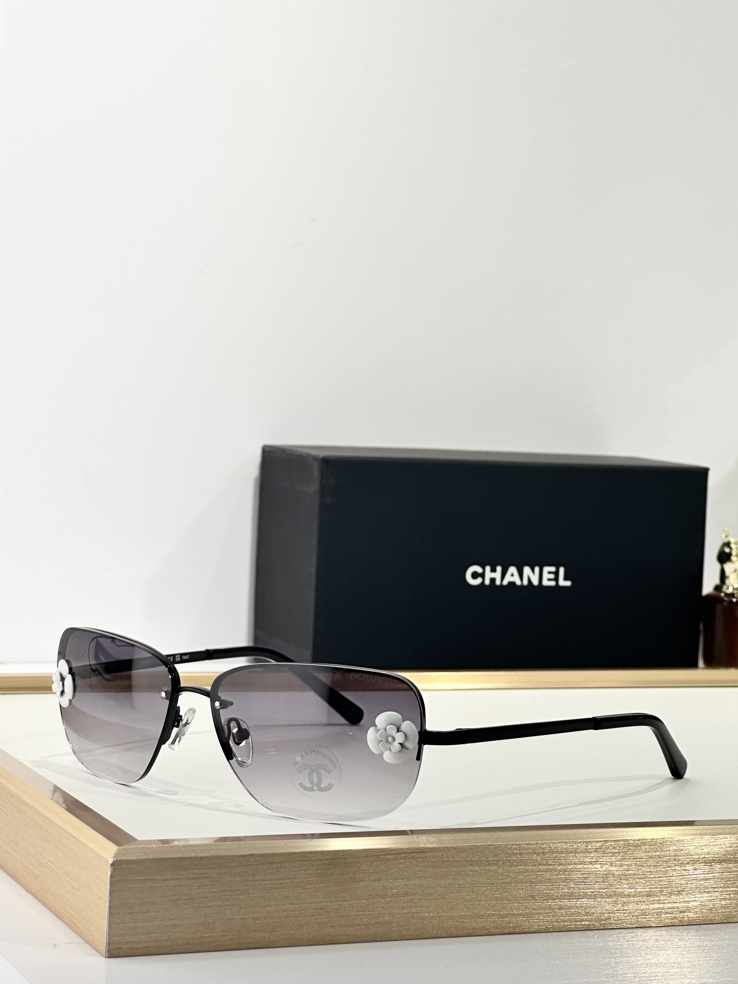 Chanel Camellia Flower Rimless Butterfly Sunglasses – Elegant Eyewear