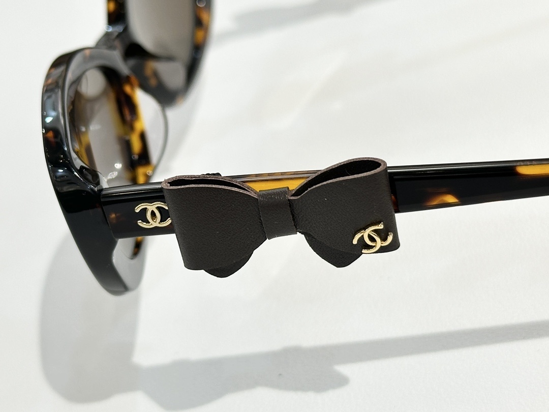 Chanel Cat-Eye Sunglasses with Leather Bow Detail & CC Logo
