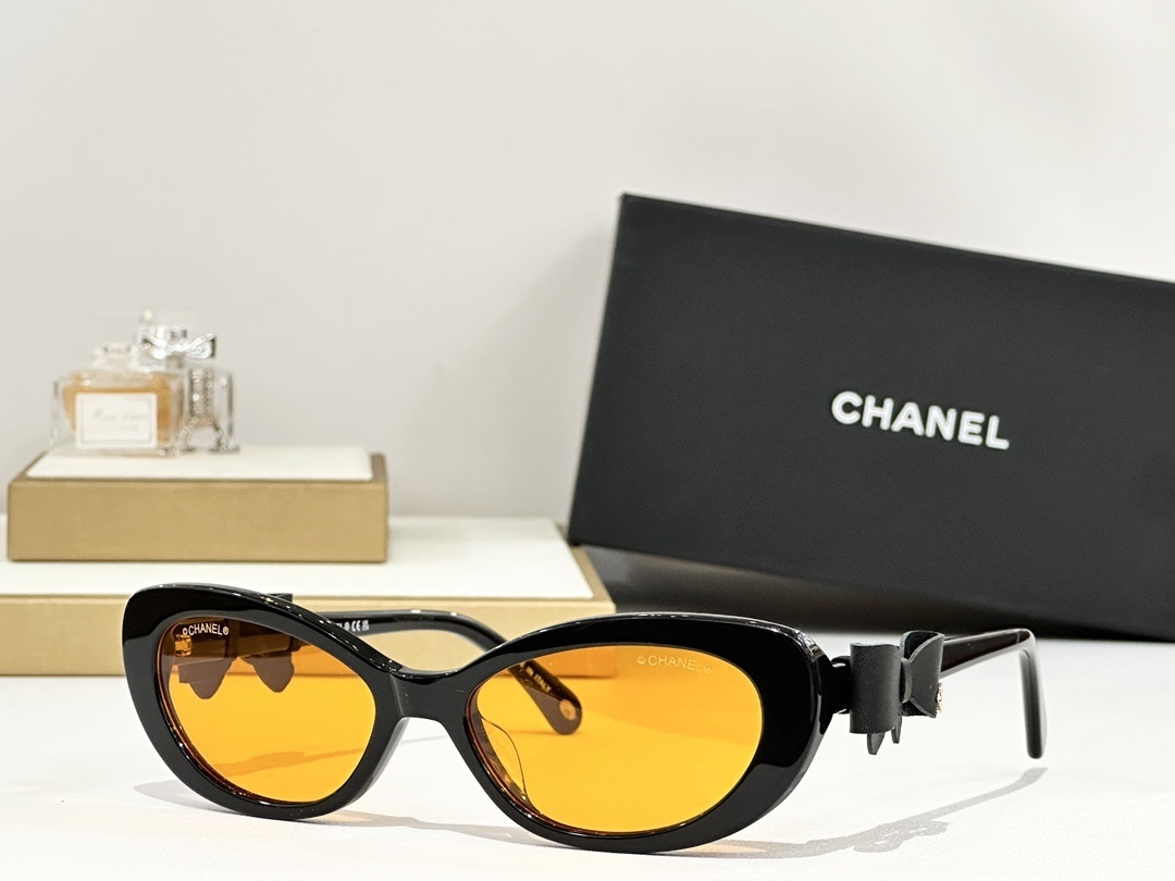 Chanel Cat-Eye Sunglasses with Leather Bow Detail & CC Logo