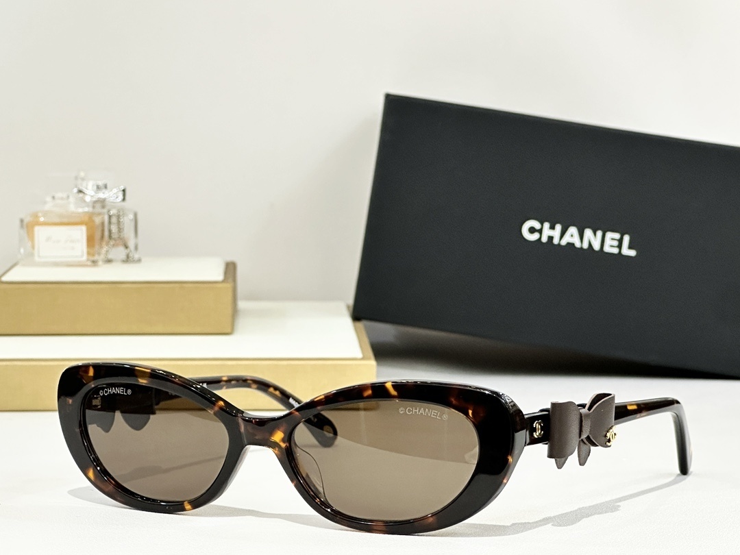 Chanel Cat-Eye Sunglasses with Leather Bow Detail & CC Logo