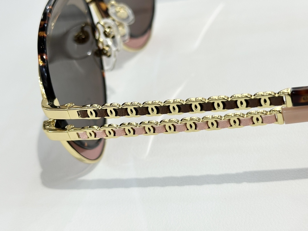 Chanel Aviator Sunglasses: Luxury Pilot Design with Chain Temples