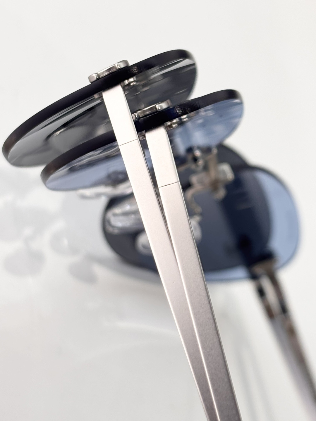 Chanel Luxury Rimless Sunglasses - Blue Tinted Lenses & Silver Logo