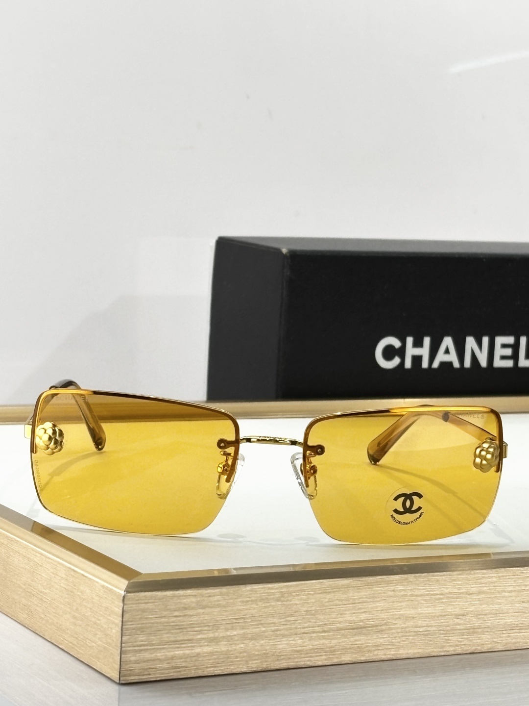 Chanel Camellia Rimless Rectangular Sunglasses – Designer Luxury