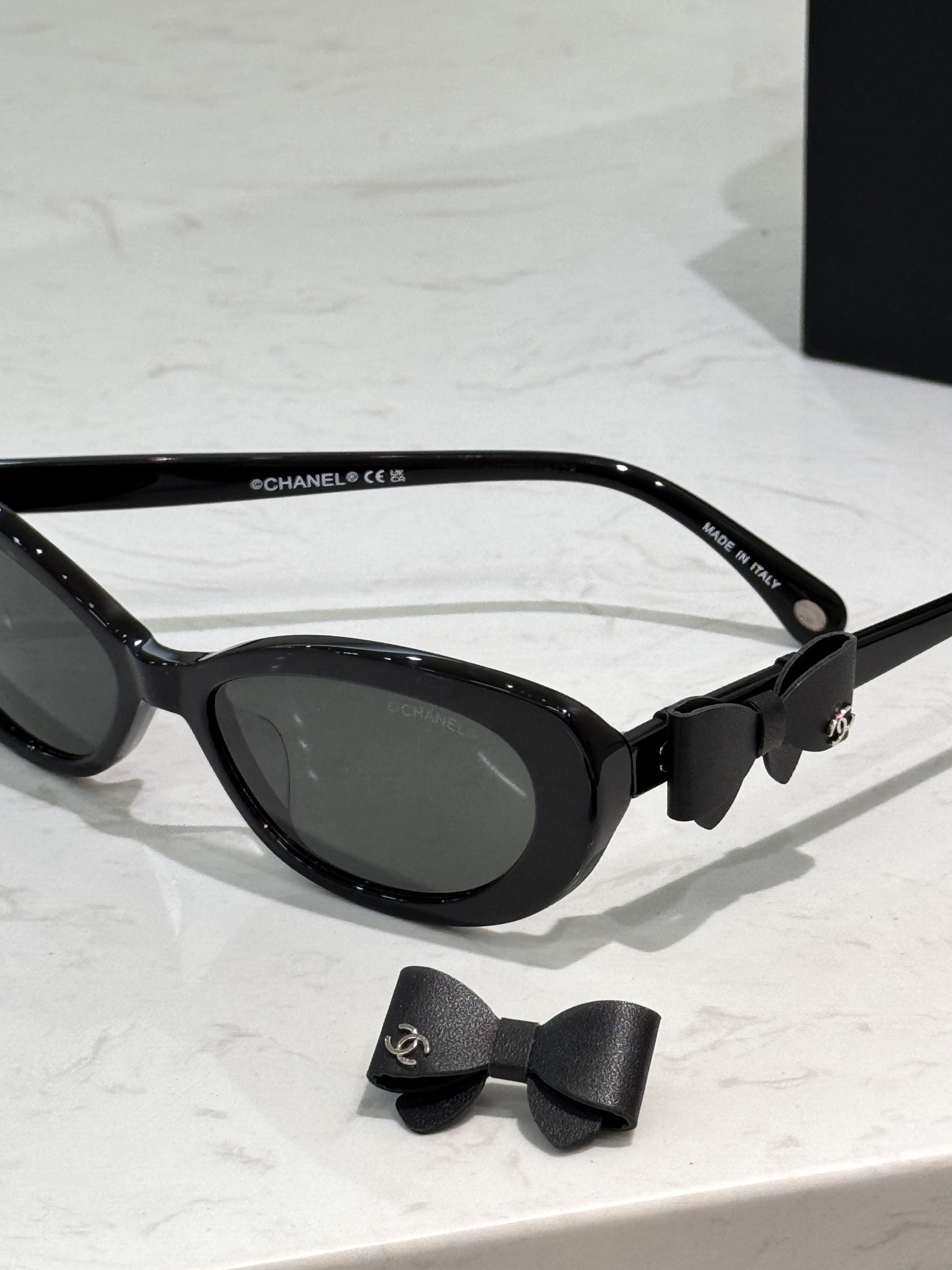 Chanel Black Oval Bow Sunglasses - Luxury Women's Eyewear