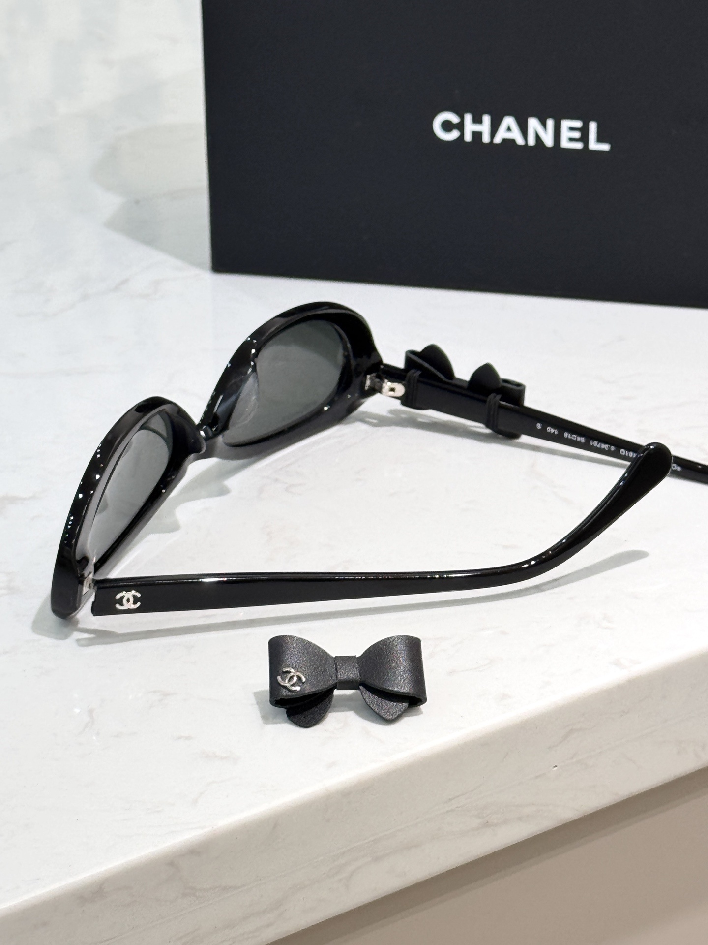 Chanel Black Oval Bow Sunglasses - Luxury Women's Eyewear