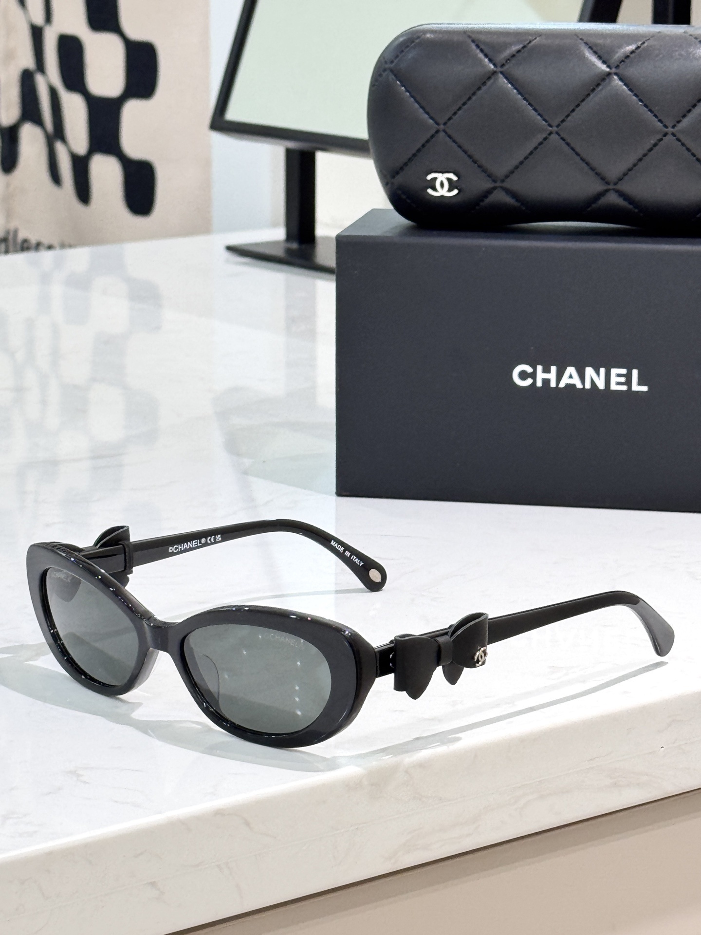 Chanel Black Oval Bow Sunglasses - Luxury Women's Eyewear